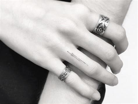 40 Ring Tattoos To Inspire Your Next Ink