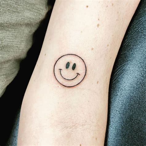 6 Ways To Create The Ultimate Smiley Tattoo Today