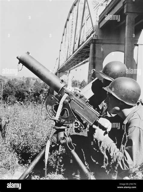 A 30 Cal Heavy Machine Gun Firing During An Assault Problem On