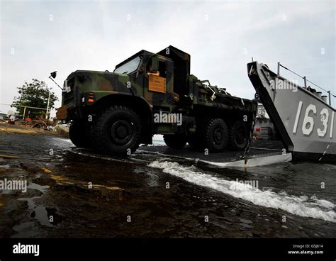 A U S Marine Corps 7 Ton Truck Rolling Off Landing Craft Utility Stock