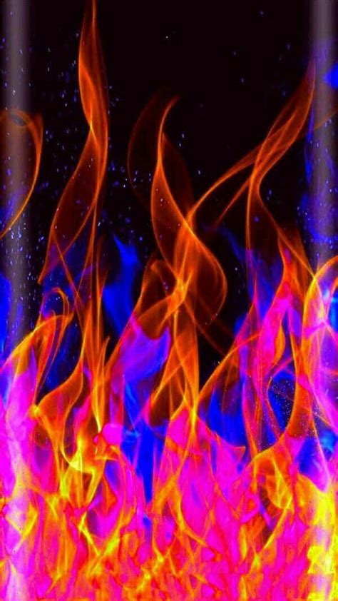 Download A Blazing Explosion Of Red And Blue Fire Wallpaper