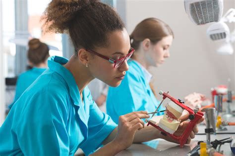 Female Students Learning Prosthetic Dentistry Inspire Dentistry