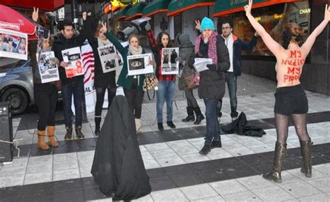 Iranian Woman Strips In Protest