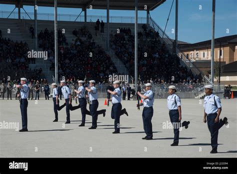 Members Of The 59Th Training Group Drill Team Perform In The Freestyle