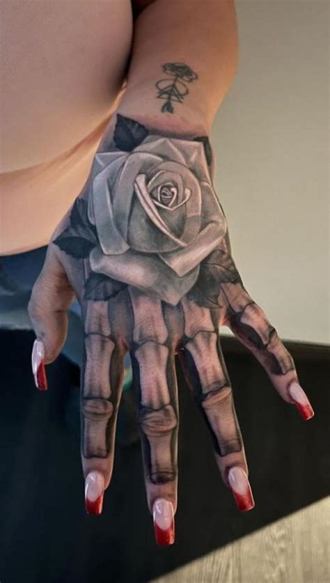 Rose Skeleton Hand Tattoo