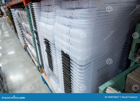 Stacks Large Plastic Storage Container Lids At Store Editorial