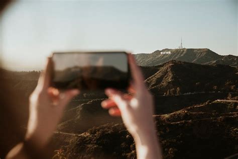 Tourist Capturing Hollywood Hills Views Premium Photo Rawpixel