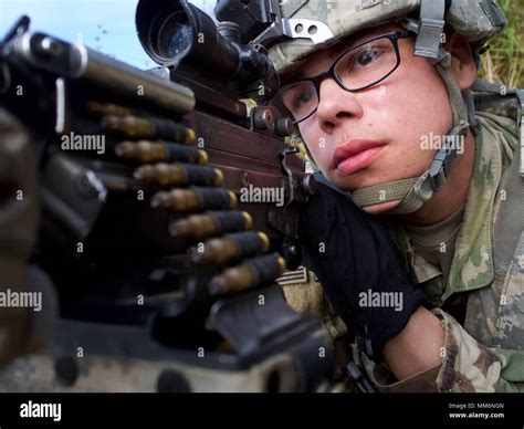 U S Army Pvt Terry Bulliner An M249 Squad Automatic Weapon Gunner