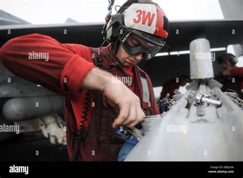 U S Navy Aviation Ordnanceman 3Rd Class Branden Samela Attaches A