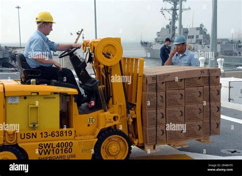 Us Navy Boatswain S Mate Seaman Directs Boatswain S 2Nd Class As He